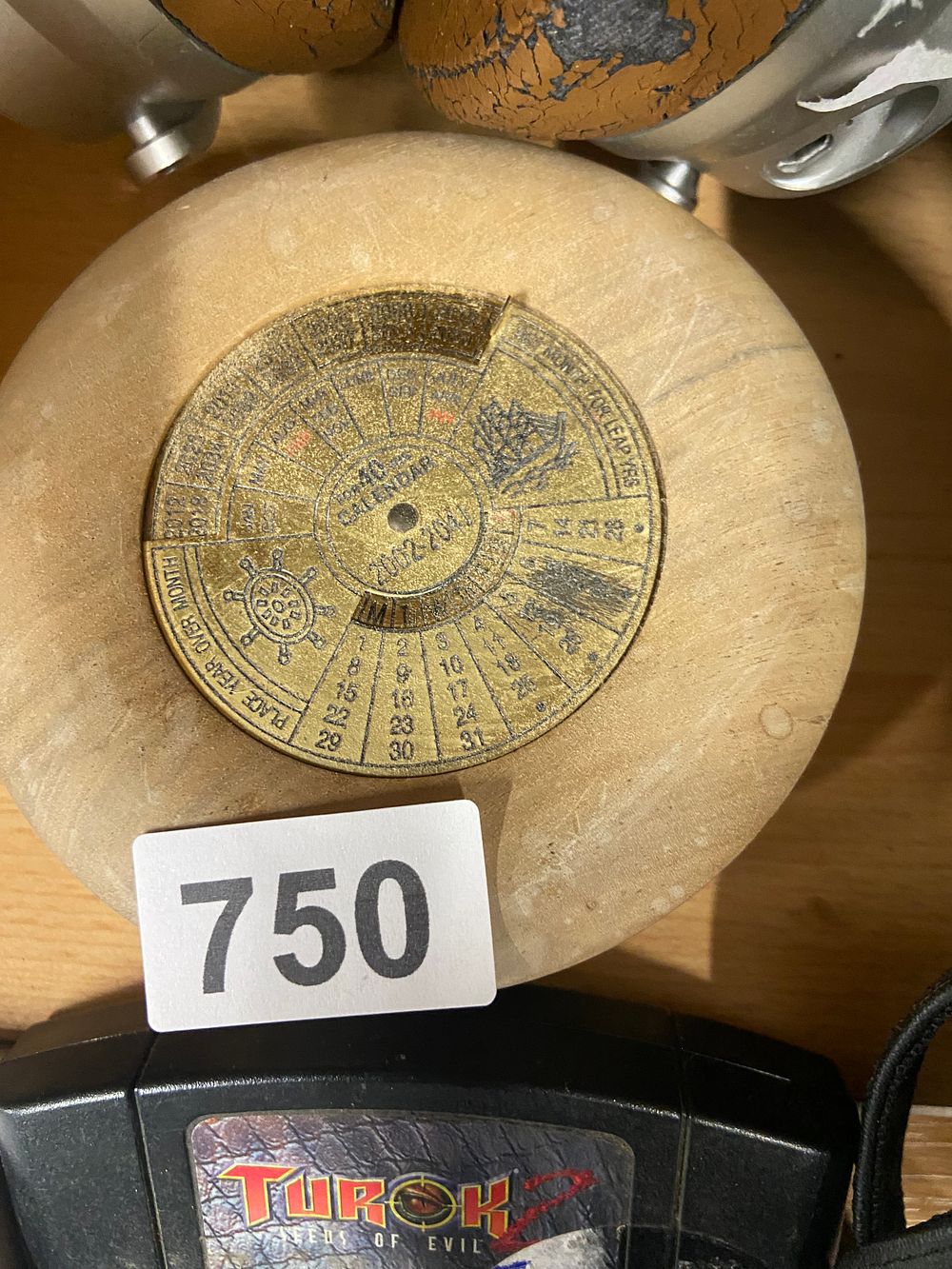 Lot 750: A Brass and Marble 40-Year Nautical Perpetual Desk...