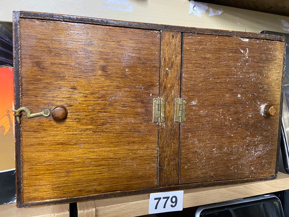 Lot 779: A Vintage Wooden Double-Door Storage Cabinet Box