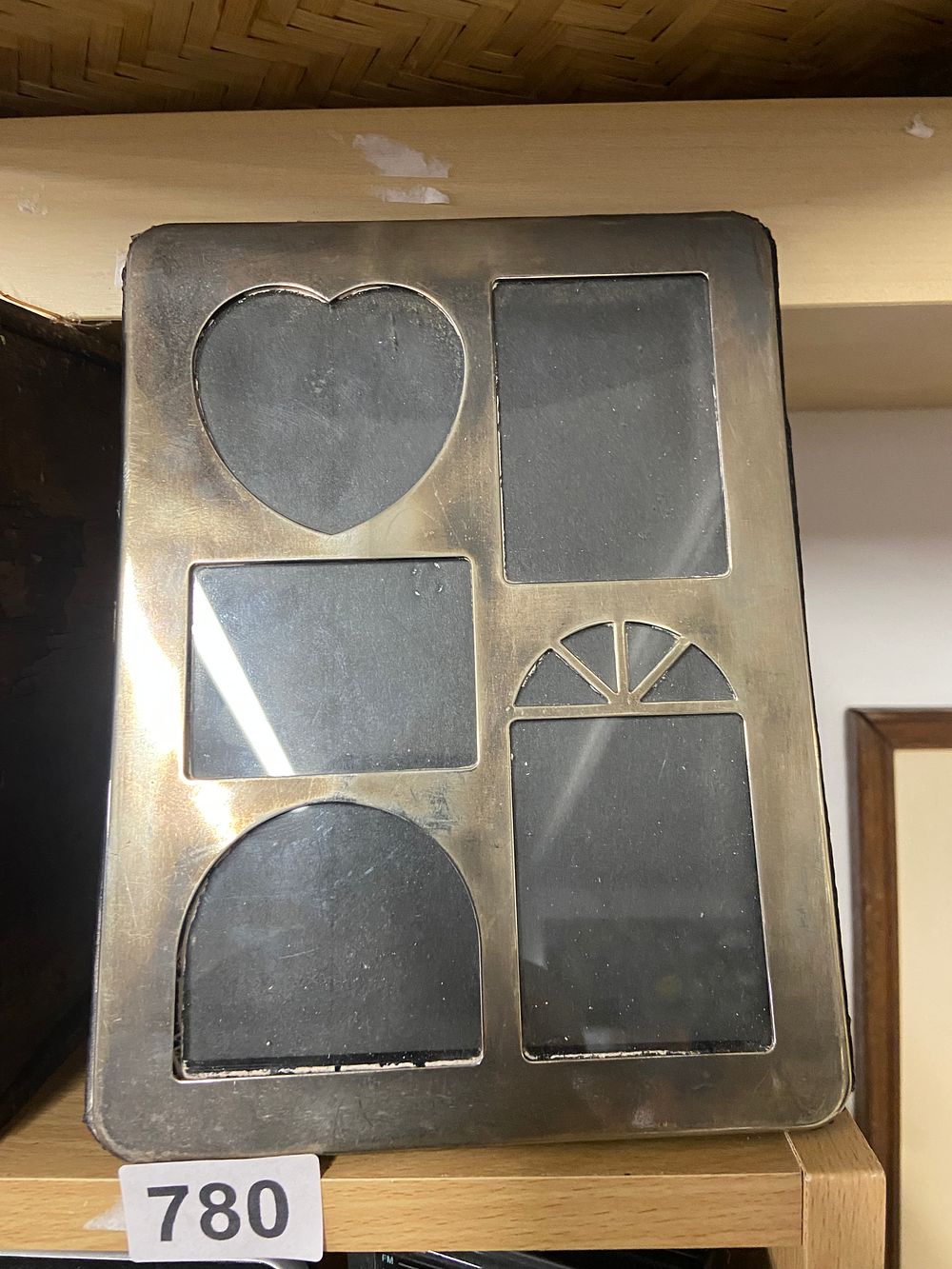 Lot 780: Silver-Toned Multi-Aperture Photo Frame, Late 20th/Early 21st Century