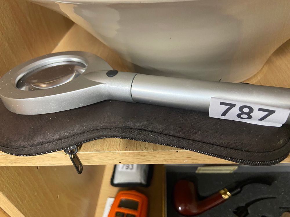 Lot 787: A Modern LED Handheld Magnifying Glass with Case