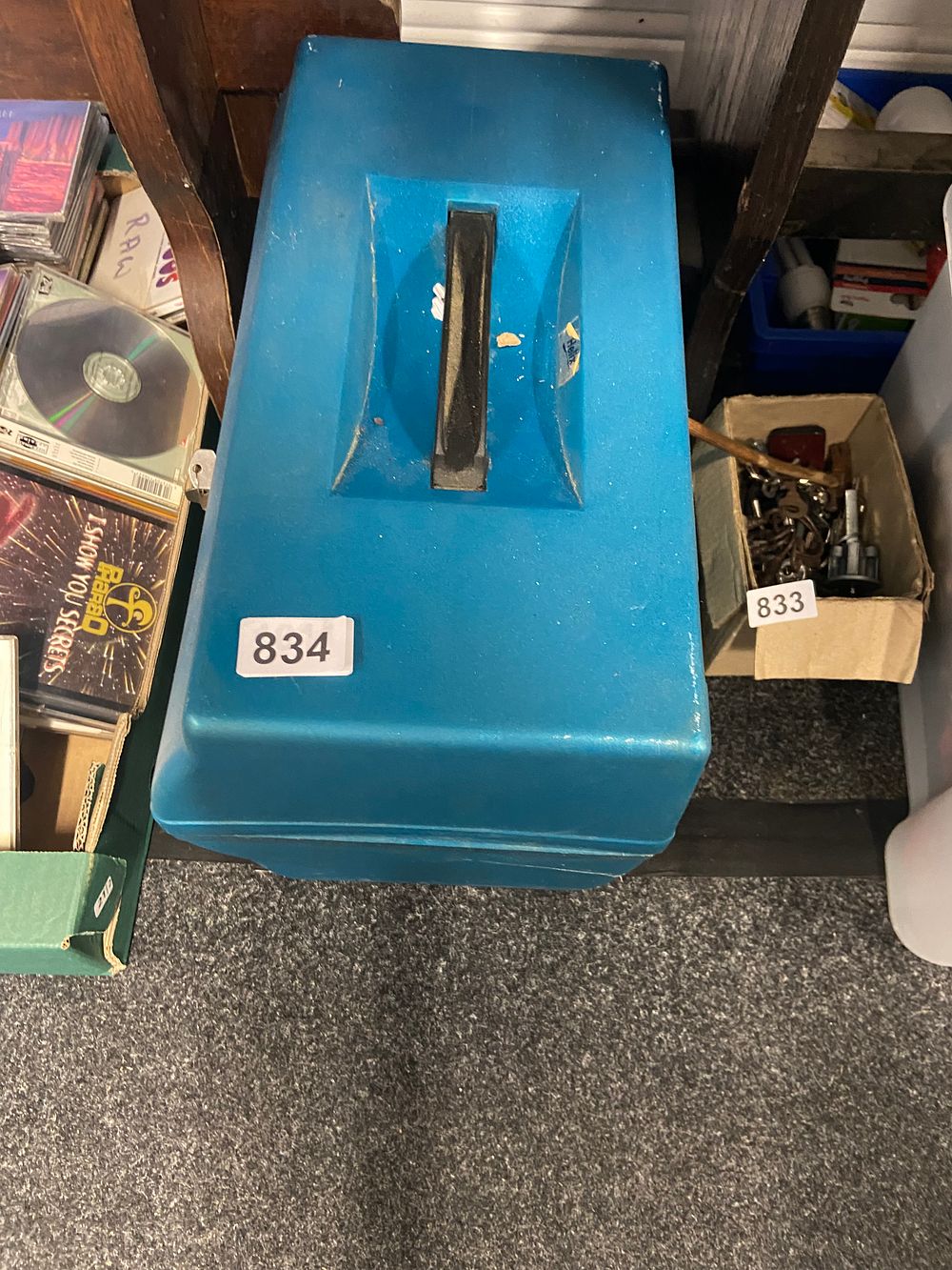Lot 834: A Teal Molded Plastic Housing for an Electronic...
