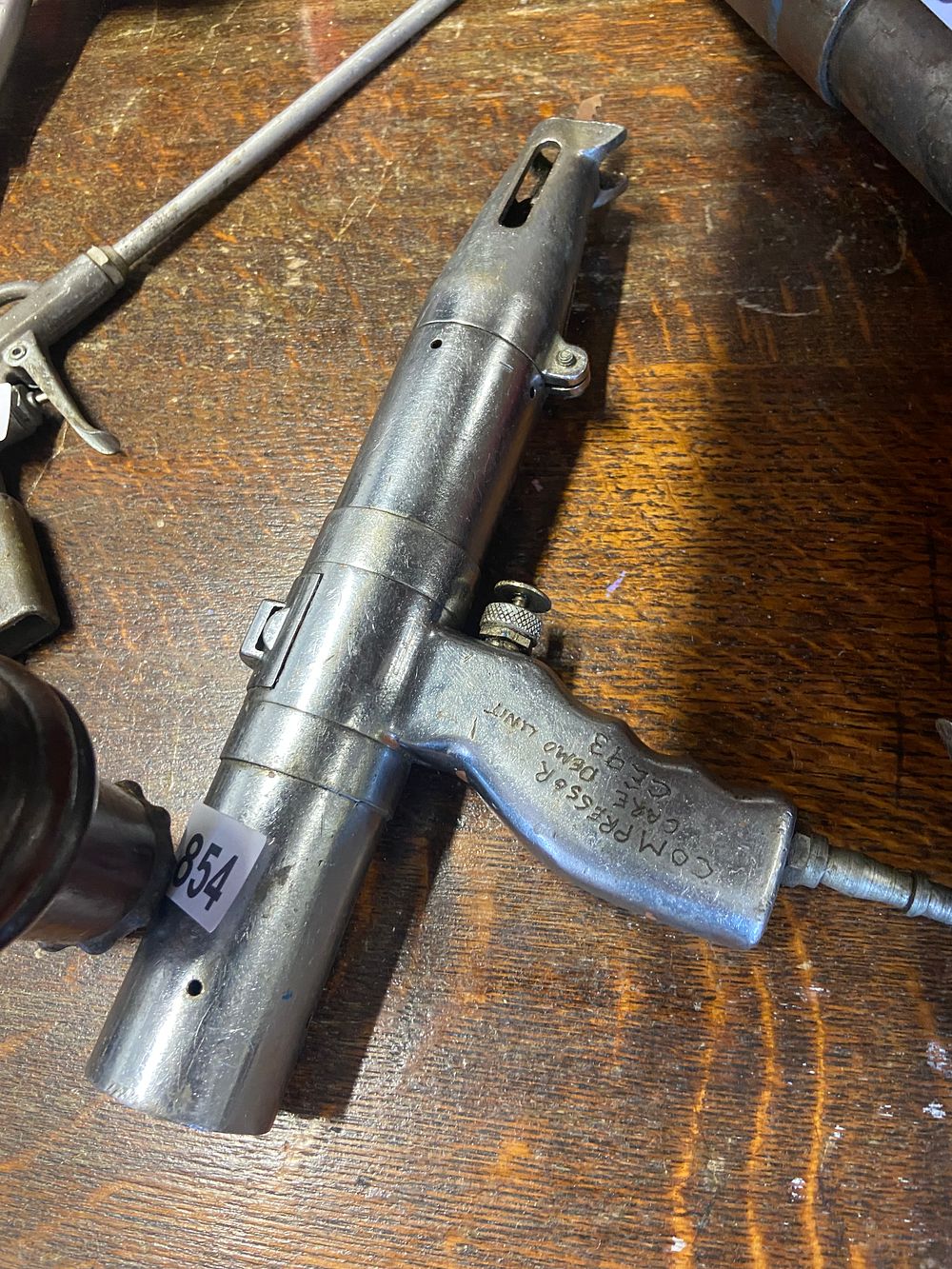 Lot 854: Vintage Firearm Bolt Assembly with 'COMPRESSOR DEMO UNIT'...