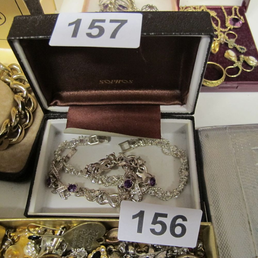 Lot 157:  Silver coloured and Amethyst Bracelets