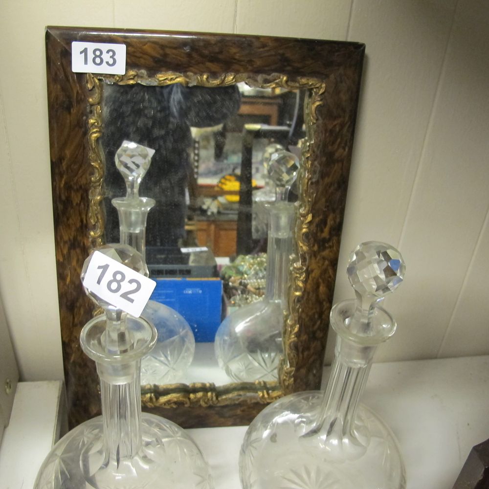 Lot 183: A Burled Wood and Gilt Rococo Style Mirror 