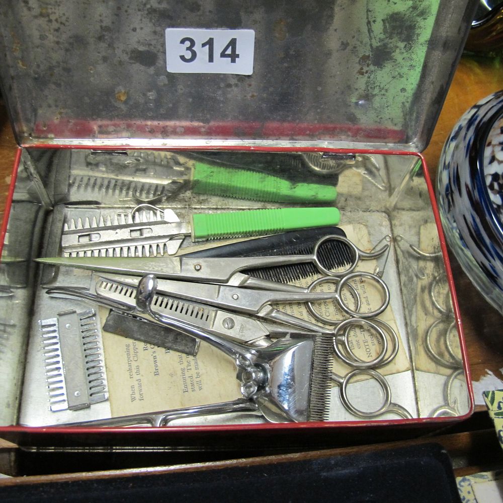 Lot 314: A Vintage Barber's Grooming Kit with Manual Tools...
