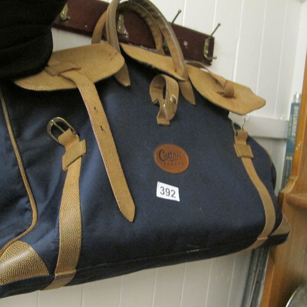 Lot 392: A Cotton Traders Navy Blue Textile and Tan...