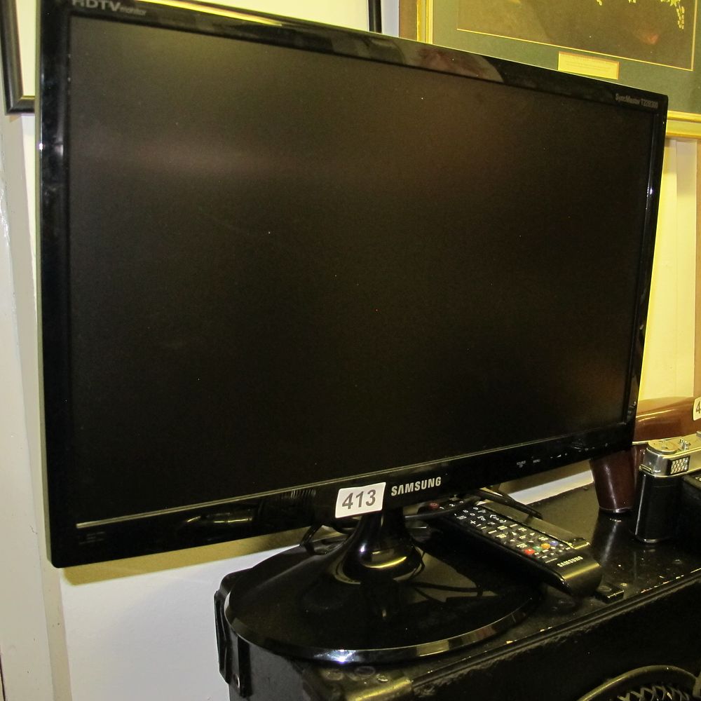 Lot 413: A Samsung SyncMaster T22B300 HDTV Monitor with Remote...