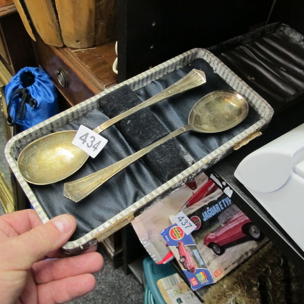 Lot 434: A Pair of WM Rogers Silverplate Serving Spoons