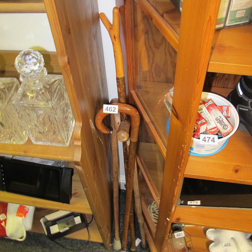 Lot 462: A Group of Three Rustic Wooden Walking Sticks 
