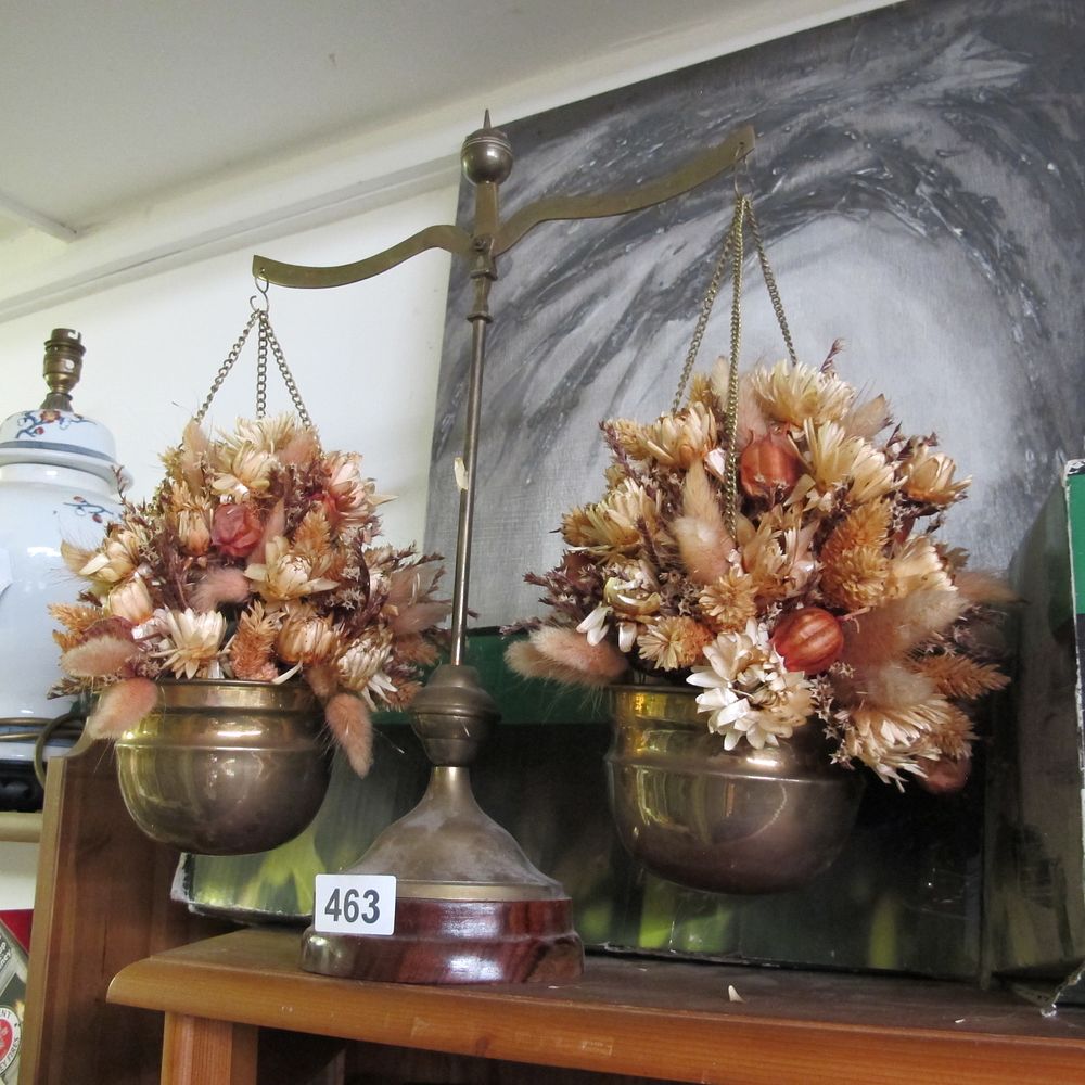 Lot 463: A Decorative Brass Balance Scale with Dried Floral...