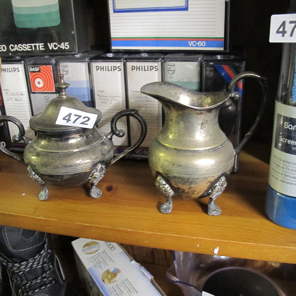 Lot 472: A Pair of Rococo Revival Style Silver-Plated Tea...