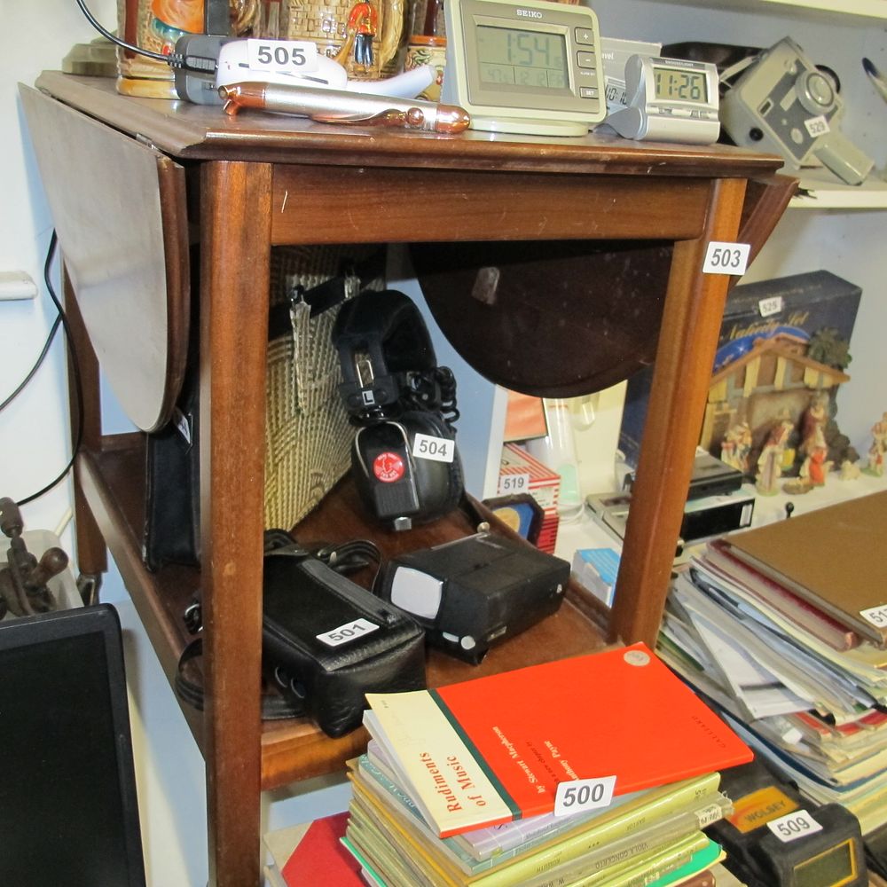 Lot 503: A Mid-20th Century Wooden Drop-Leaf Table with a...