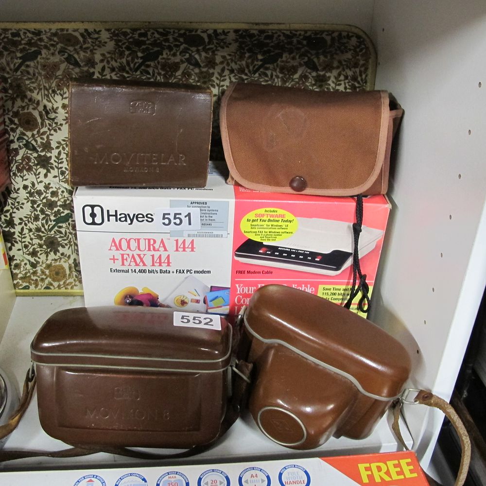 Lot 552: A Zeiss Ikon Camera Case, Two External Modems,...