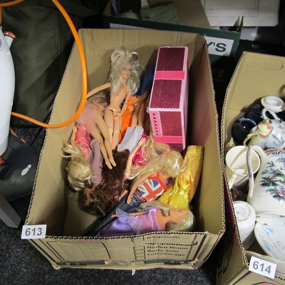 Lot 613: A Collection of Approximately Ten Barbie-Type Fashion Dolls...