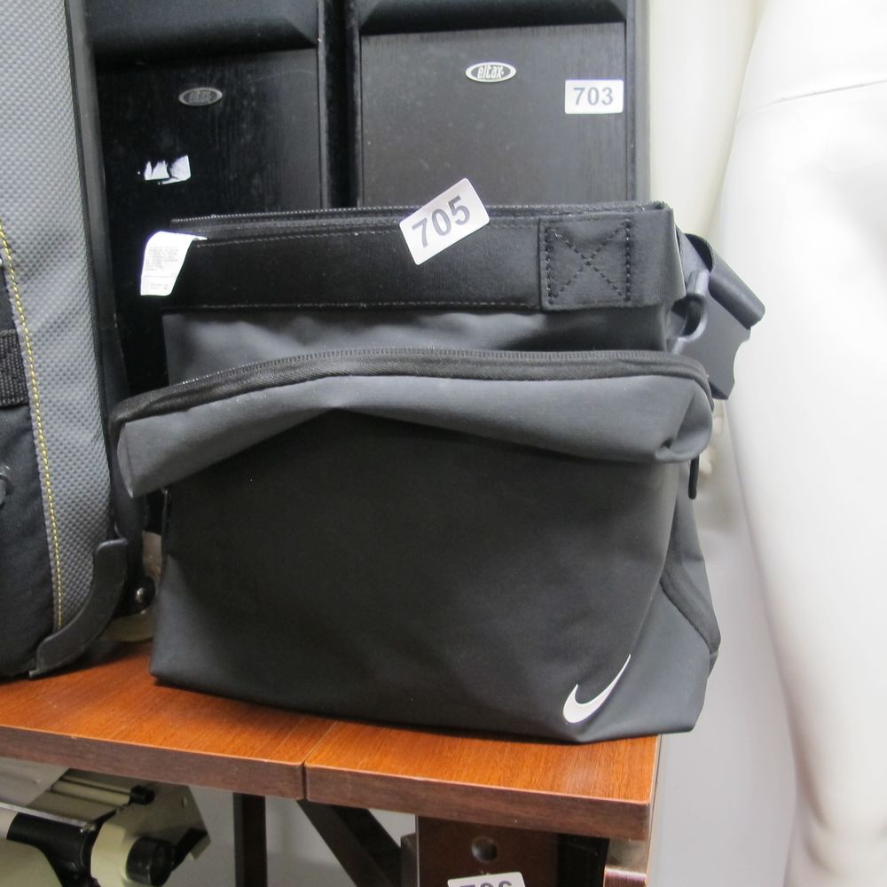 Lot 705: A Nike Synthetic Messenger-Style Bag