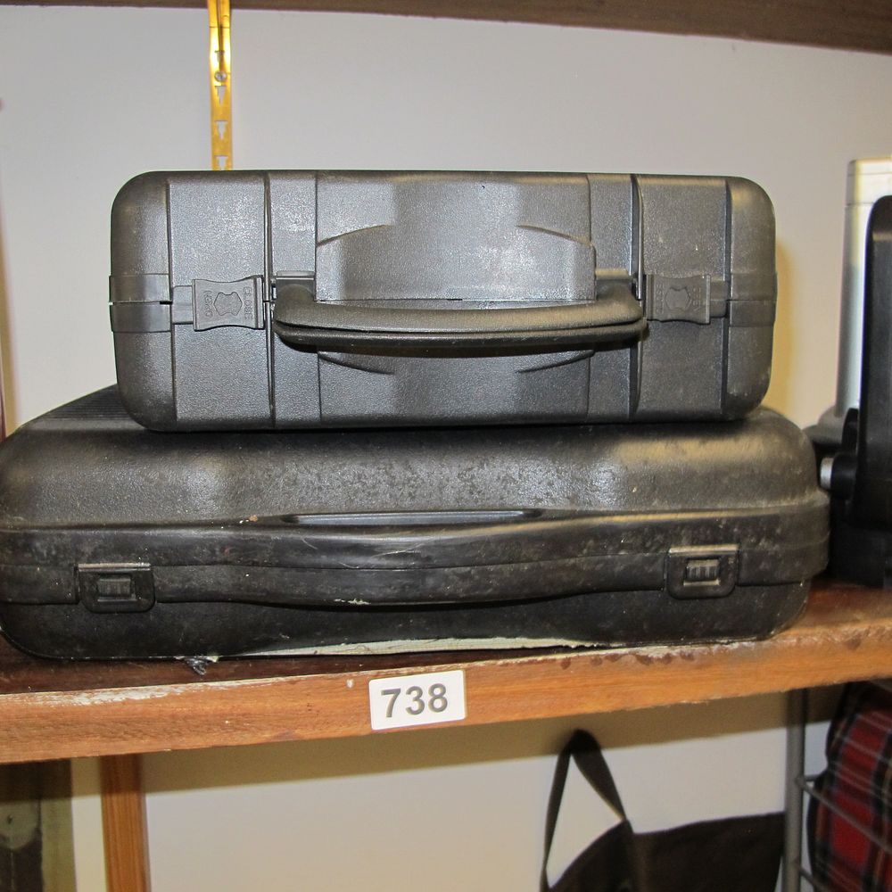 Lot 738: A Pair of Black Hard-Shell Utility Cases