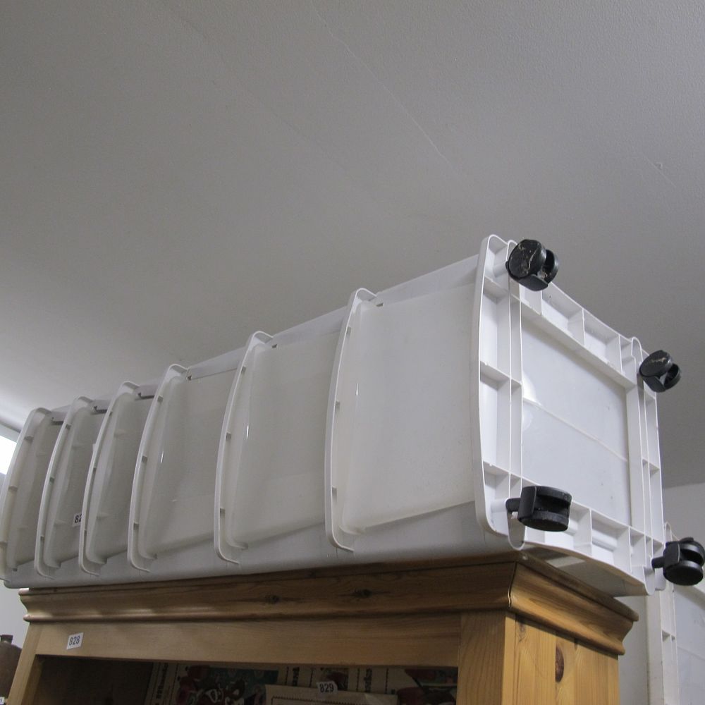 Lot 827: A Set of Contemporary Modular Rolling Storage Bins
