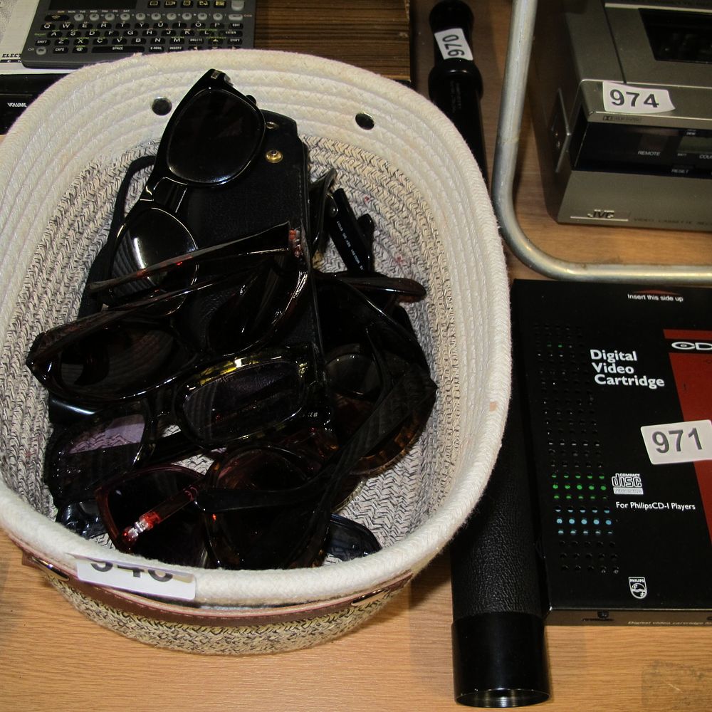 Lot 948: A Collection of Modern Sunglasses in a Woven...