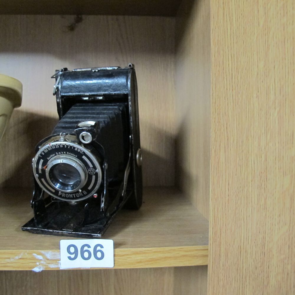 Lot 966: A German Folding Bellows Camera with Prontor II...