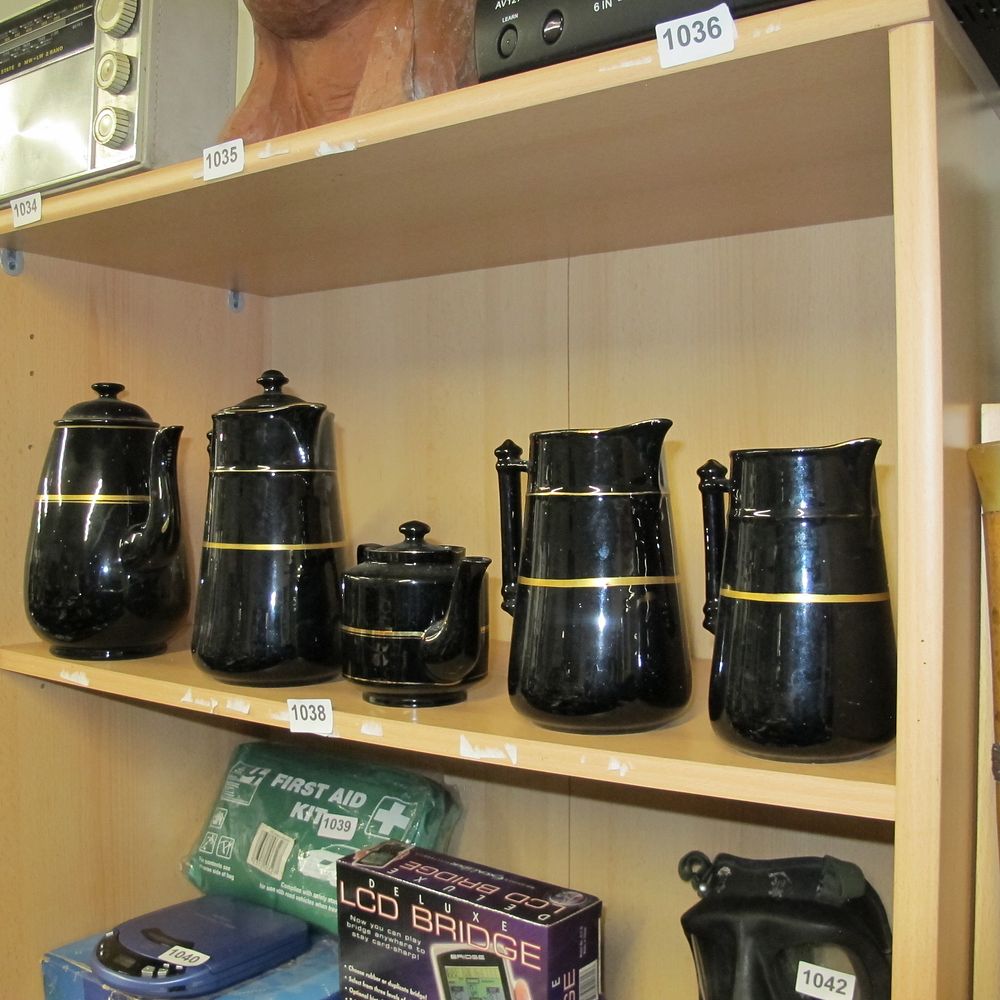 Lot 1038: A Set of Five Ceramic Beverage Service Pieces,...