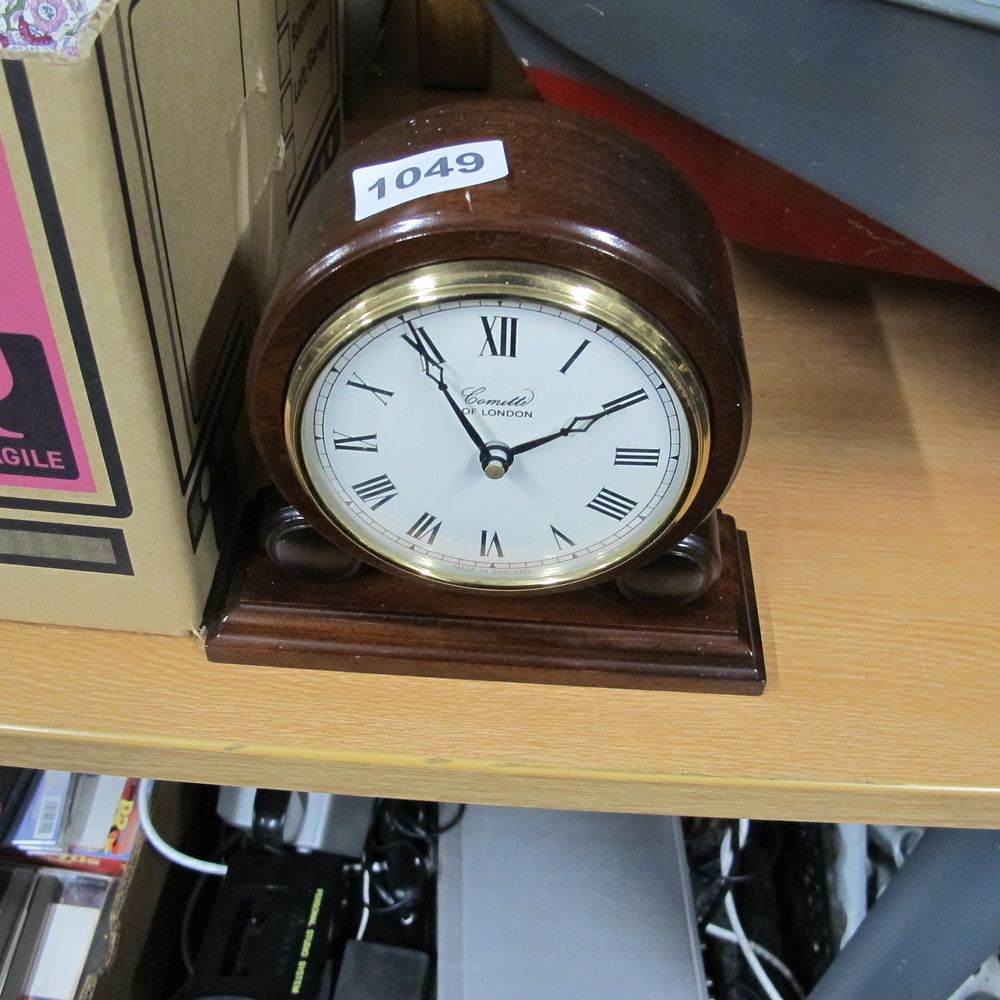 Lot 1049: A Comitti of London Mahogany Drumhead Mantel Clock