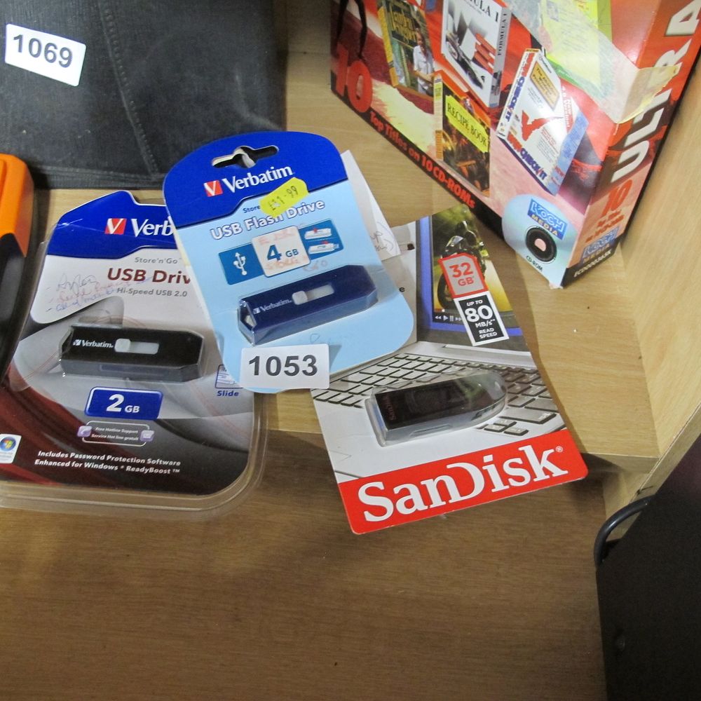 Lot 1053: A Group of Verbatim and SanDisk USB Flash...