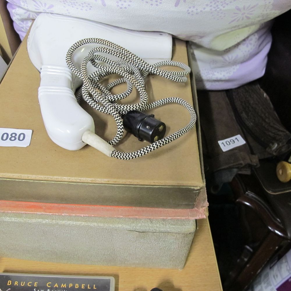 Lot 1080: Vintage White Plastic Travel Iron with Chevron Fabric...