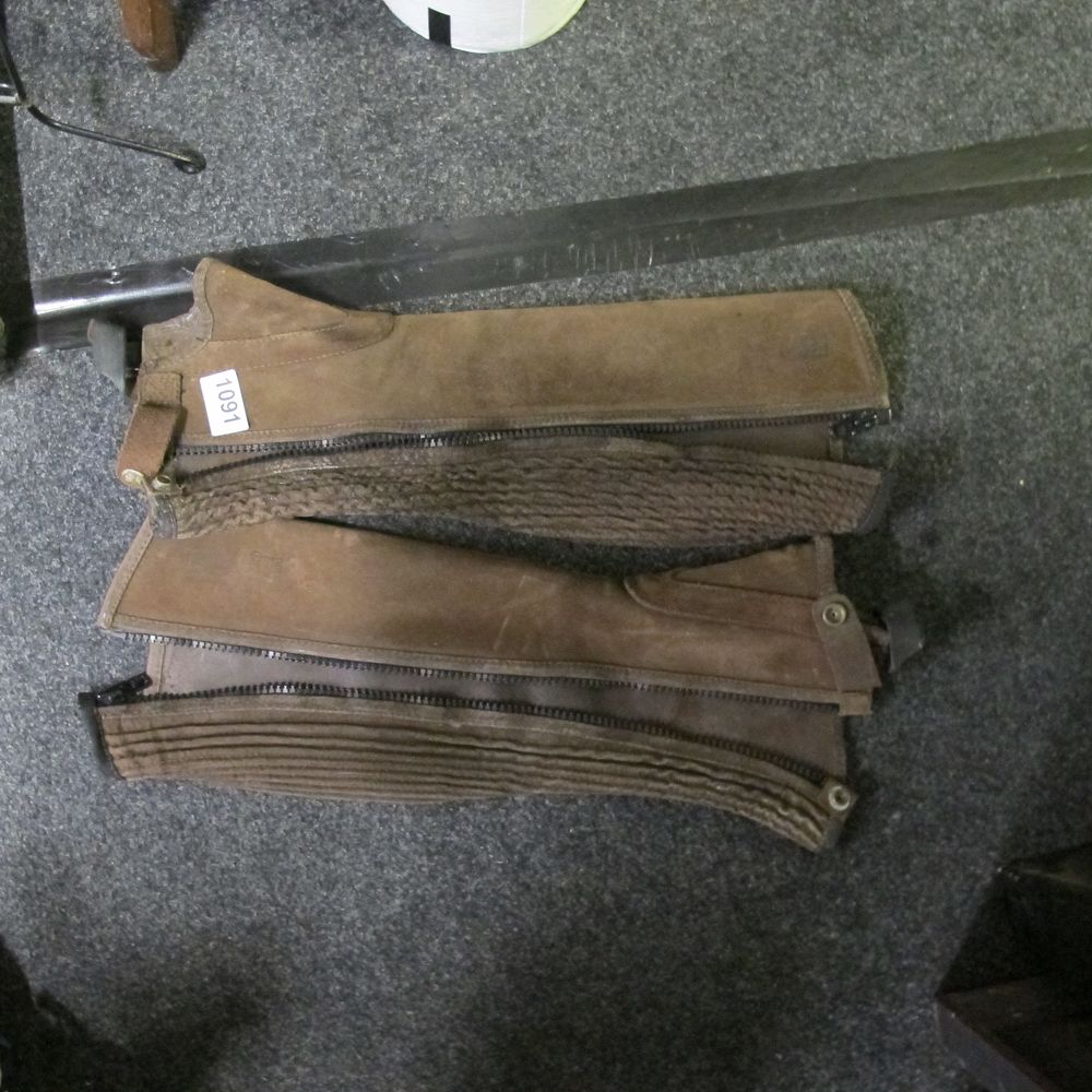 Lot 1091: A Pair of Tredstep Brown Suede Half Chaps