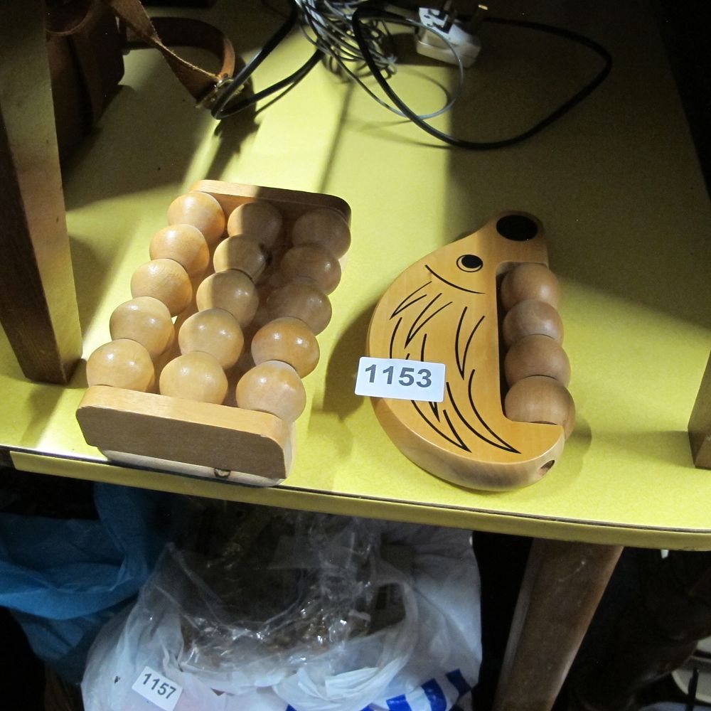 Lot 1153: A Group of Two Wooden Gua Sha and...