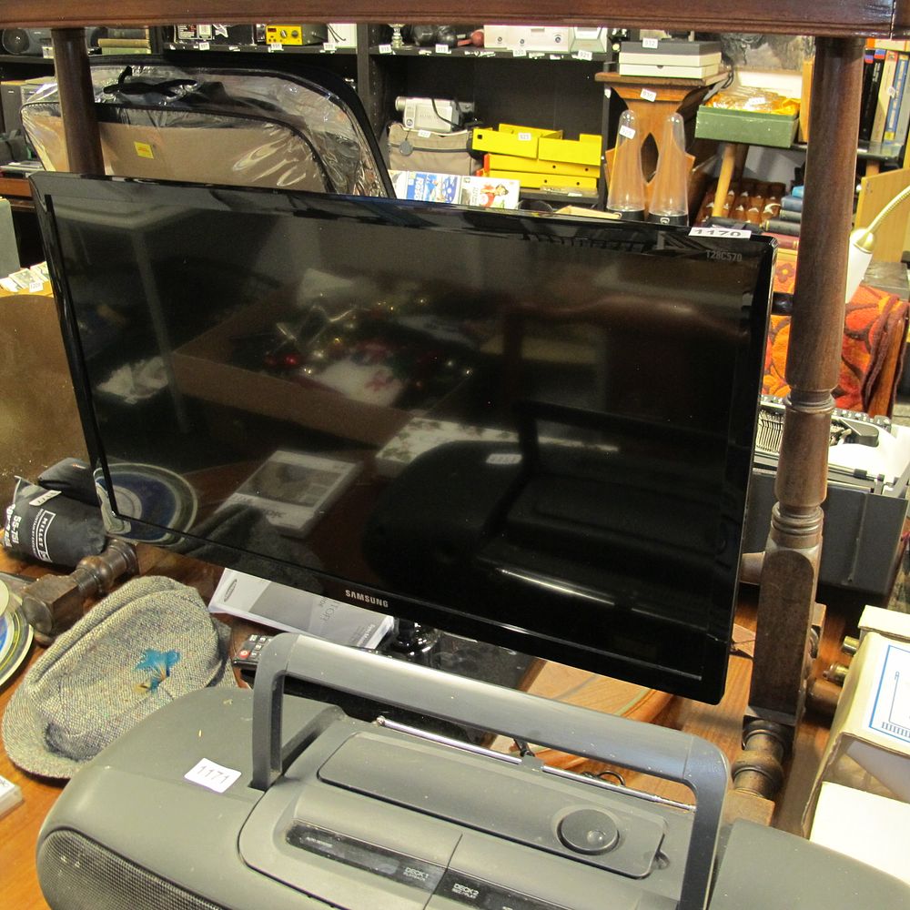 Lot 1170: A Samsung T28C570 Flat-Screen Monitor/Television and a Portable...