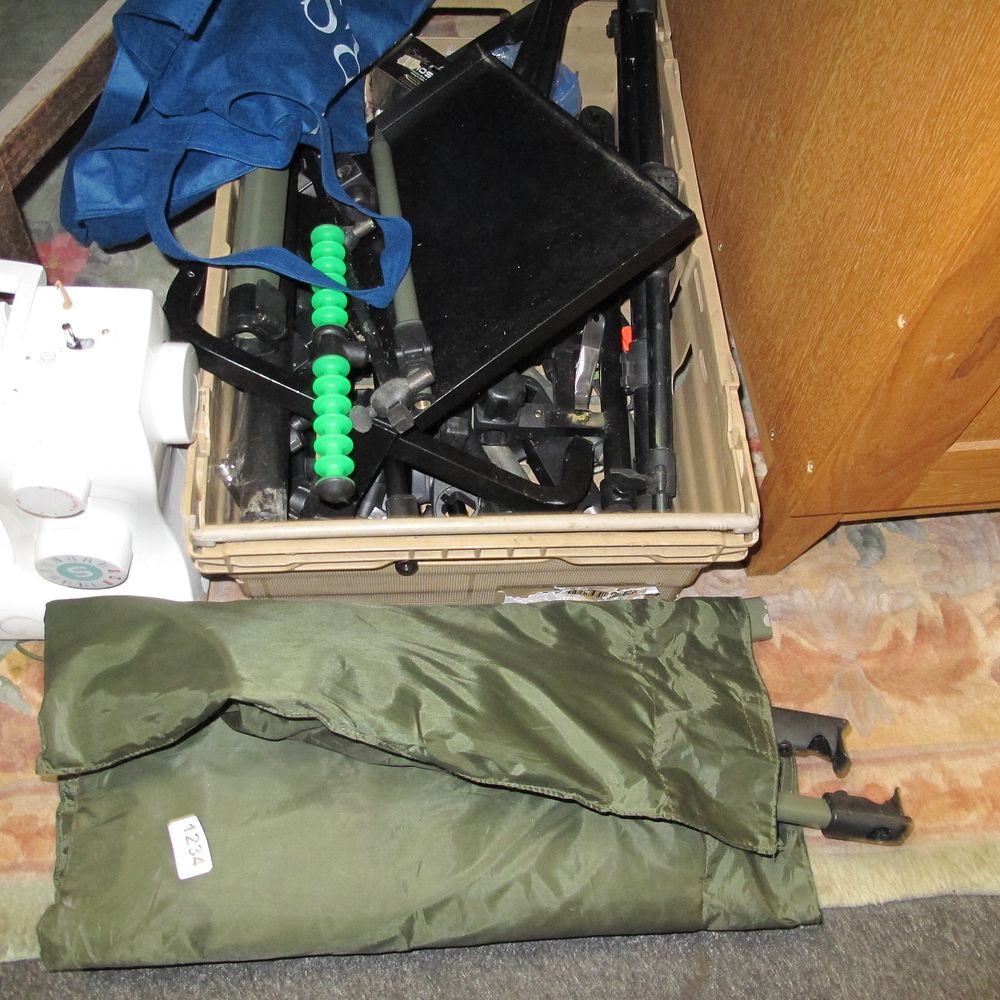 Lot 1234: a tub of fishing equipment
