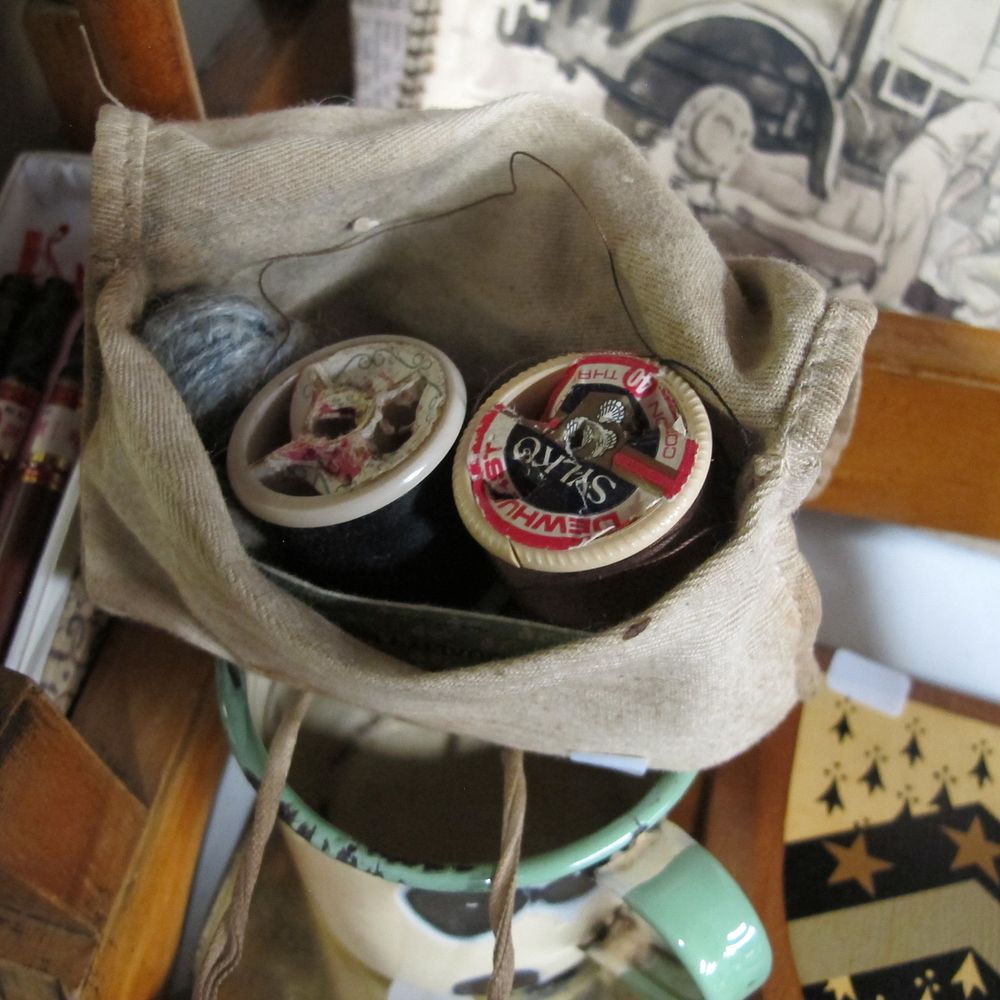 Lot 568: A Collection of Vintage Sewing Supplies with a...