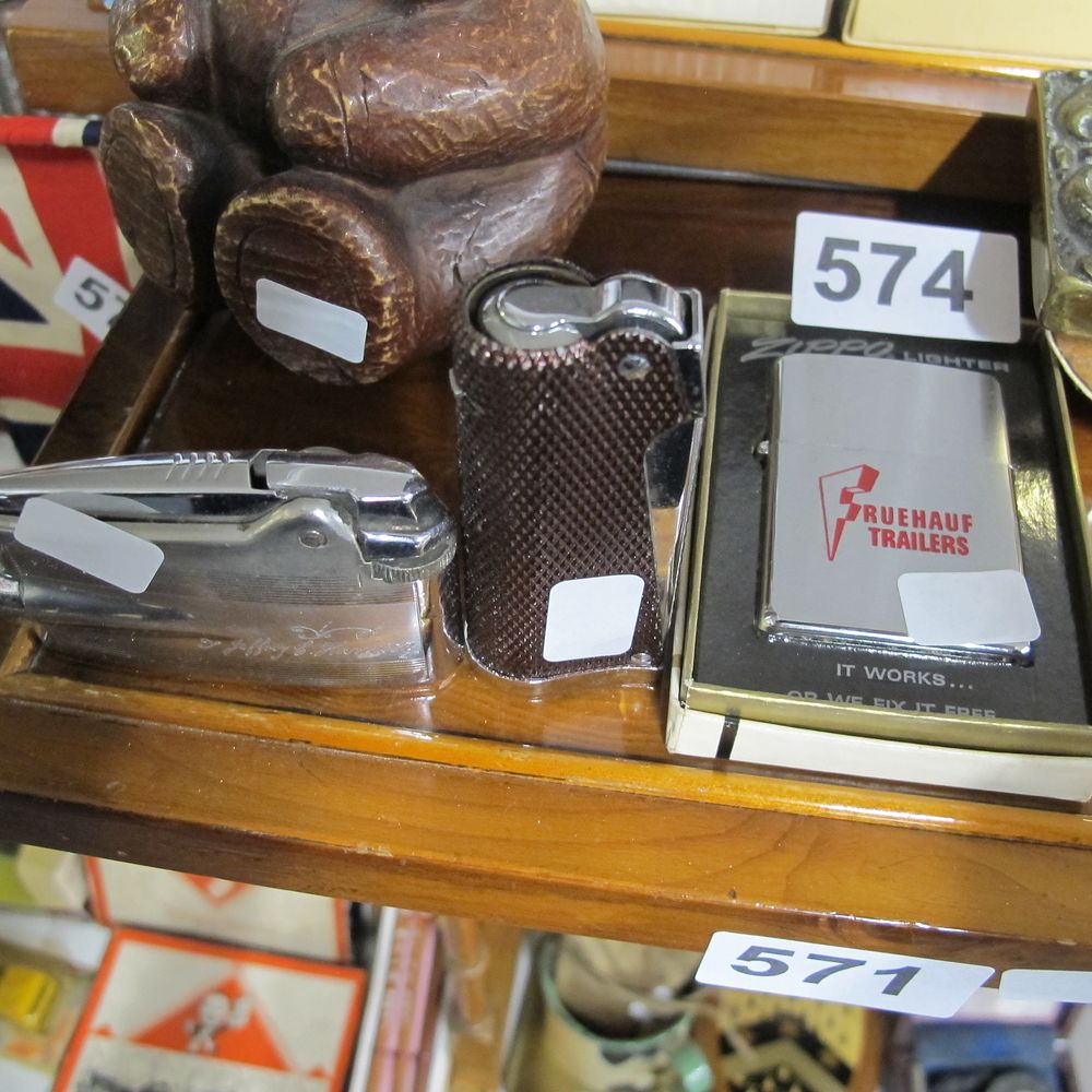 Lot 574: Zippo and Assorted Lighters, Chrome and Resin, Mid-20th...