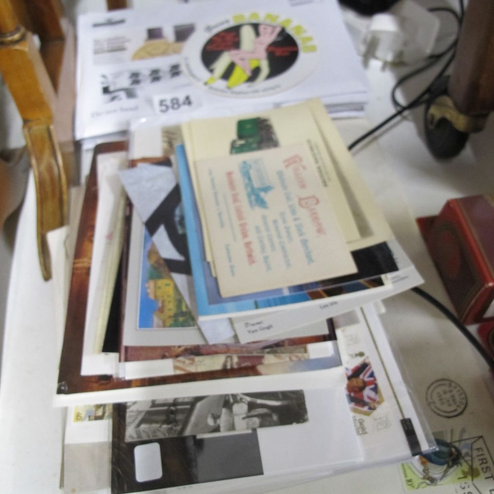 Lot 584: Mixed Ephemera Collection, Postcards, Philatelic Items, and Trade...