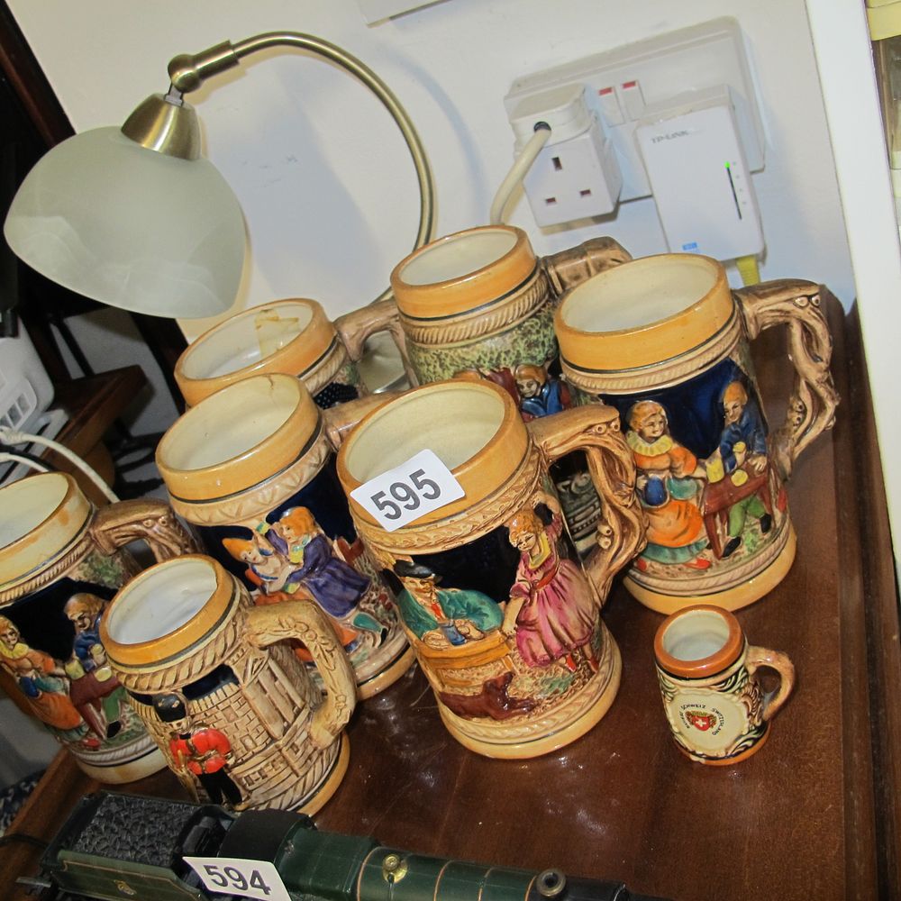 Lot 595: Generic German-Style, Relief Beer Mugs and Miniature, Mid-to-Late...