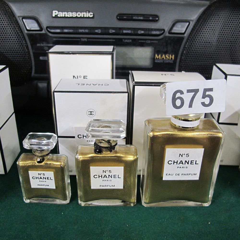 Lot 675: Empty Chanel No. 5 Fragrance Collection, Three Graduated...