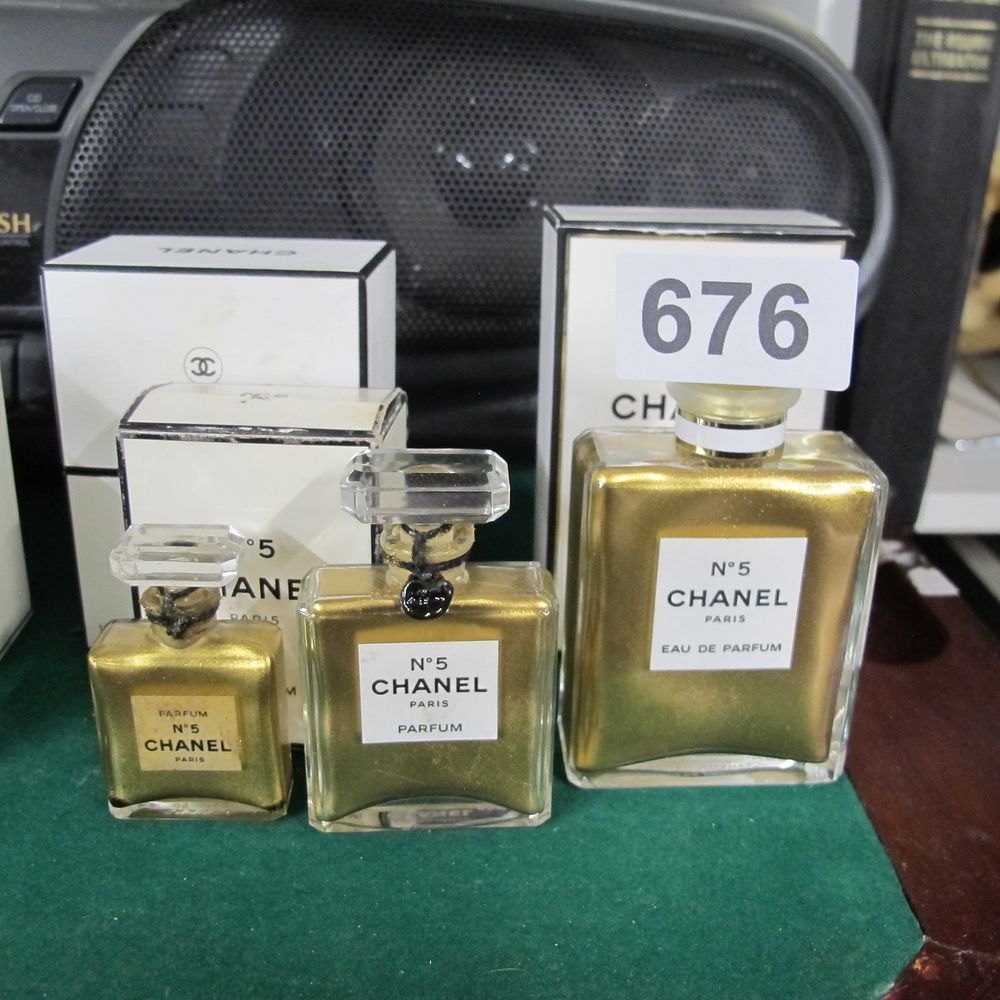 Lot 676: Empty Chanel Fragrance Bottles, No. 5 Glass and...