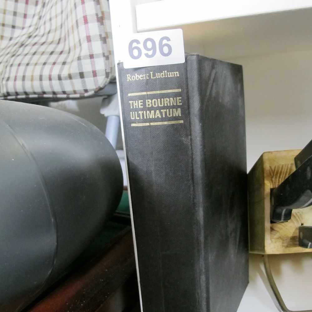 Lot 696: Ludlum, Robert. The Bourne Ultimatum. Random House, 1990....