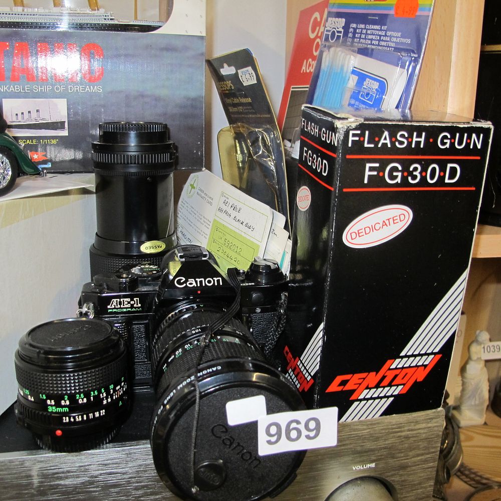 Lot 969: Canon AE-1 Program Black Body SLR Outfit with...