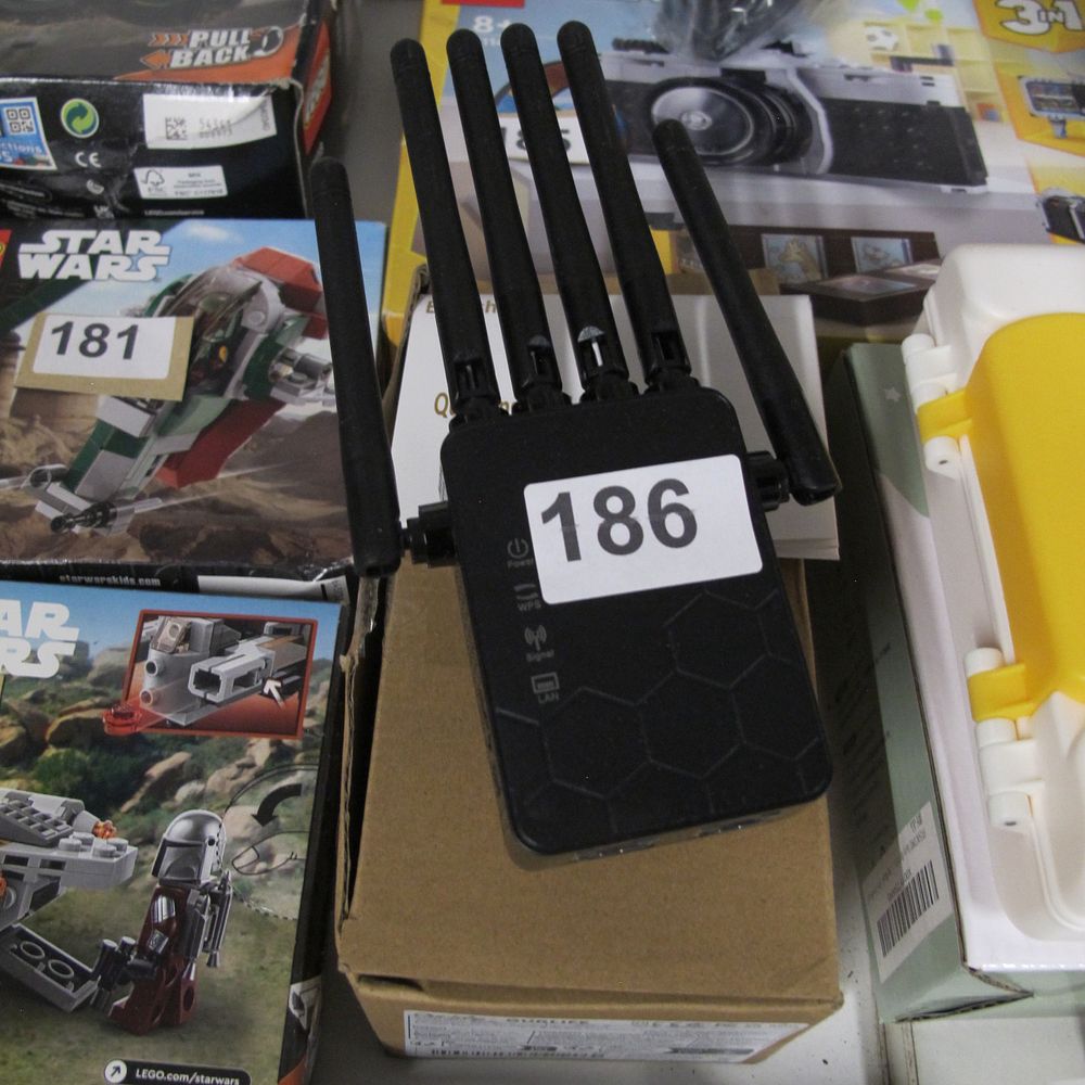 Lot 186: A WiFi Extender Signal Booster for Home Long...