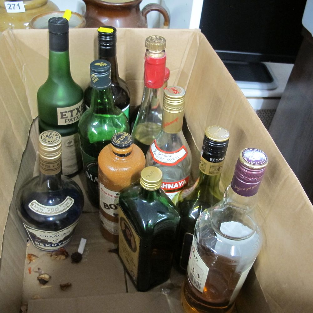 Lot 276: An Assortment of Spirits and Liqueurs with Ceramic...