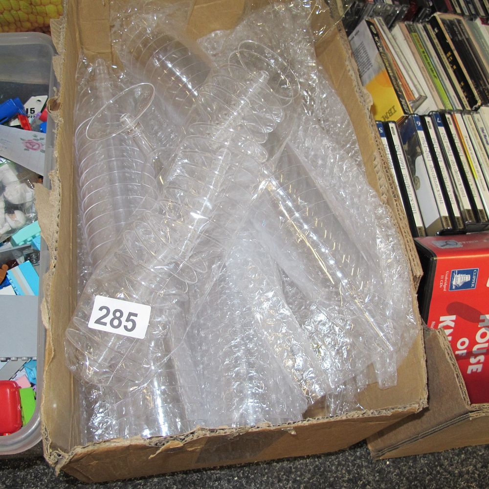 Lot 285: A Collection of Clear Plastic Disposable Champagne Flutes