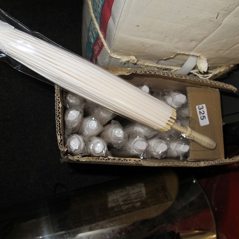 Lot 325: A Collection of White Paper Wedding Parasols