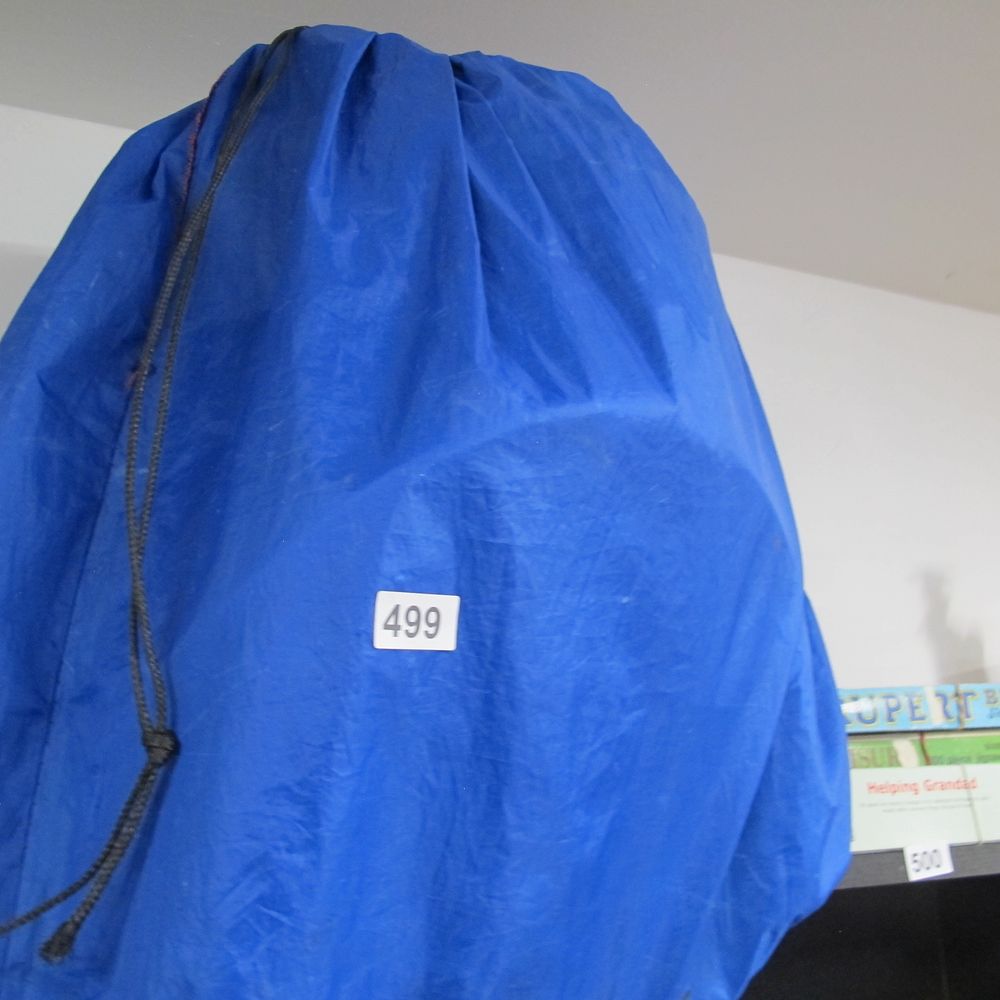 Lot 499: A rolling water carrier in bag
