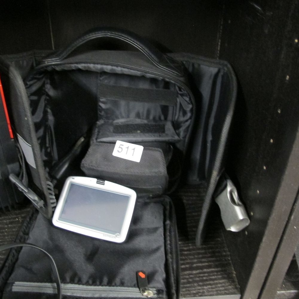 Lot 511: A TomTom GPS Navigation Equipment and Accessories