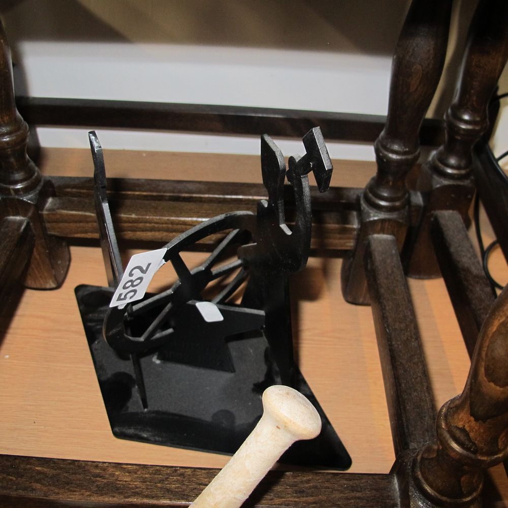 Lot 582: A Black-Finished Metal Silhouette Sculpture of a Blacksmith