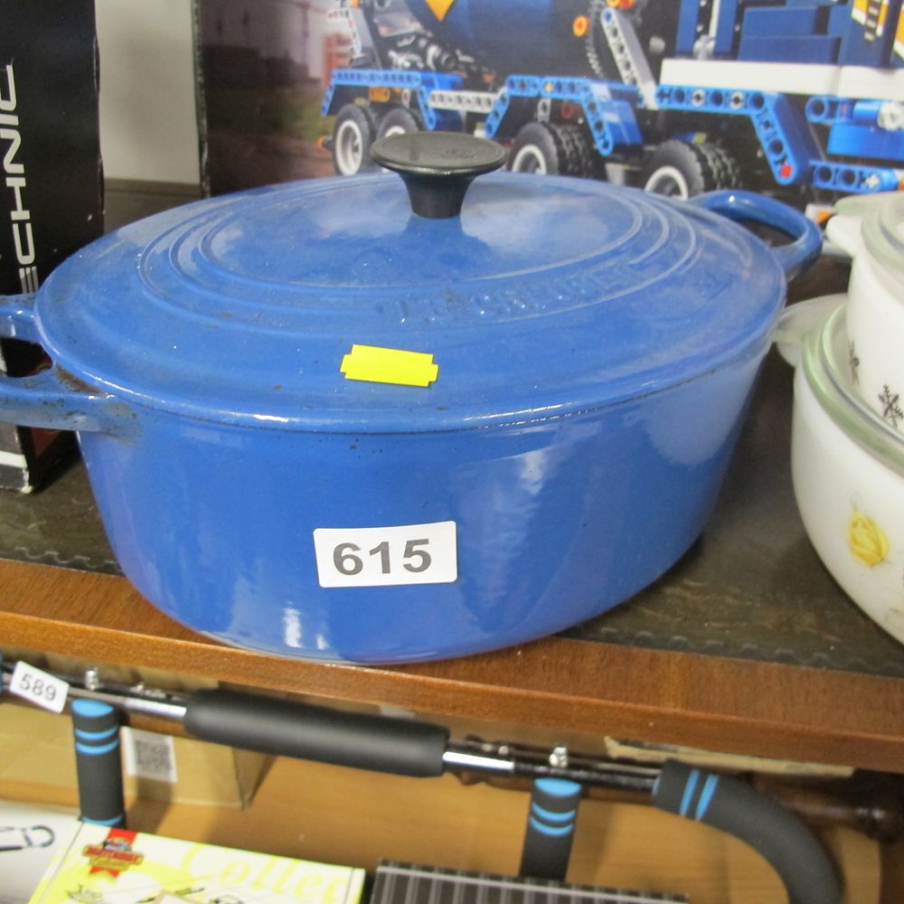Lot 615: Le Creuset Enameled Cast Iron Signature Oval Dutch...