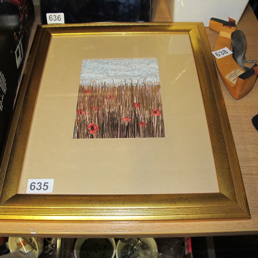Lot 635: A Framed Needlework Landscape Depicting Poppies in a...