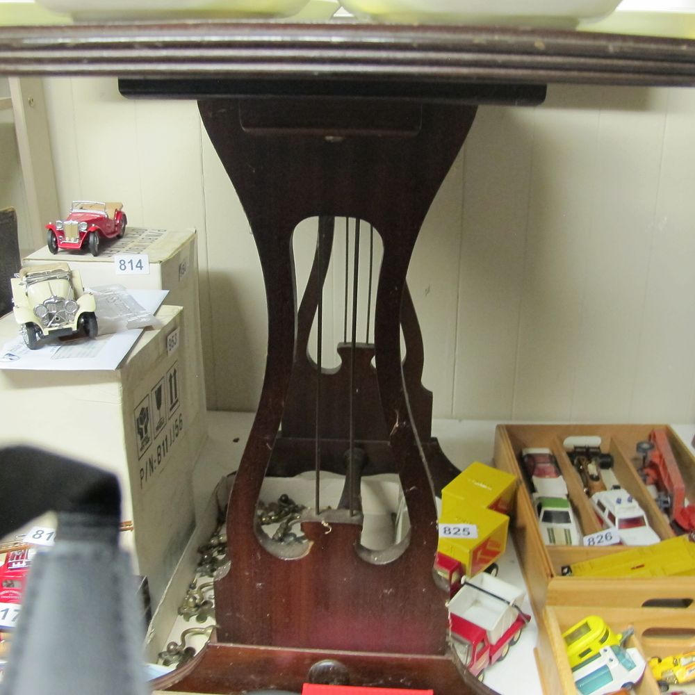 Lot 821: A Mahogany Lyre-Base Table and an Assortment of...