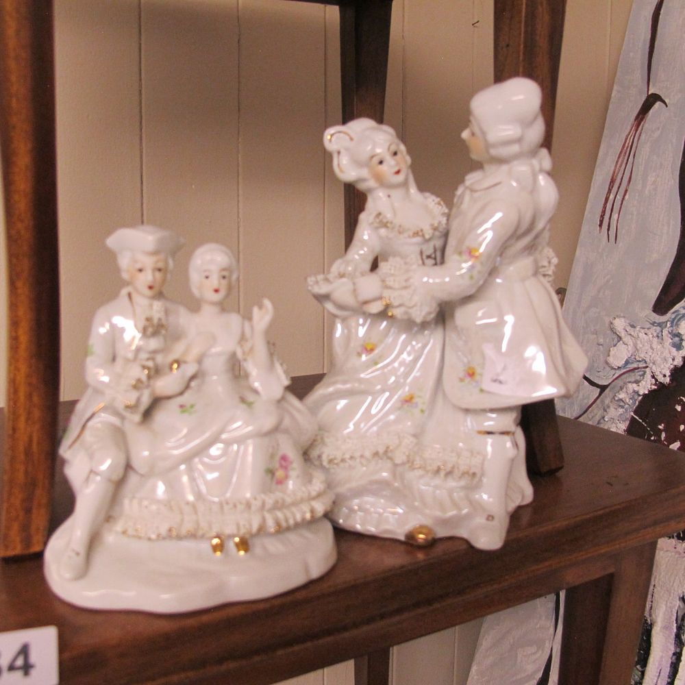 Lot 834: A Pair of Victorian Style Porcelain Courting Couple...